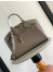 Louis Vuitton Lock It MM Bag in Taurillon Leather M22927