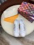 Louis Vuitton White Time Out Sneakers with Silver Signature