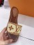 Louis Vuitton Lock It Flat Mules In Raffia