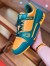 Louis Vuitton Men's LV Trainer Sneakers In Orange Monogram Leather
