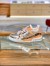 Louis Vuitton Men's LV Trainer Sneakers In Silver Metallic Calfskin
