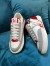 Louis Vuitton Charlie Sneakers In White Leather With Red Detail