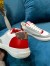 Louis Vuitton Charlie Sneakers In White Leather With Red Detail