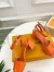 Louis Vuitton Shake Sandals 55mm In Orange Patent Calfskin