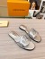 Louis Vuitton LV Isola Flat Slides In Silver Metallic Leather