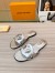 Louis Vuitton LV Isola Flat Slides In Silver Metallic Leather