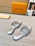 Louis Vuitton LV Isola Flat Slides In Silver Metallic Leather