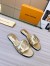 Louis Vuitton LV Isola Flat Slides In Gold Metallic Leather