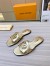Louis Vuitton LV Isola Flat Slides In Gold Metallic Leather