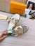 Louis Vuitton LV Isola Flat Slides In Gold Metallic Leather