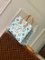 Louis Vuitton OnTheGo MM Bag in Monogram Tiles Canvas M11262
