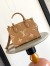 Louis Vuitton Onthego PM Bag in Bicolor Monogram Empreinte Leather M12513
