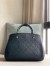 Louis Vuitton Montaigne MM Bag In Monogram Empreinte Leather M41048