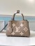 Louis Vuitton Montaigne BB Bag In Bicolor Empreinte Leather M45489