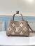 Louis Vuitton Montaigne BB Bag In Bicolor Empreinte Leather M45489