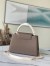 Louis Vuitton Capucines MM Bag with Chain Braided Leather Strap M59516