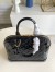 Louis Vuitton Alma PM Bag In Monogram Vernis Leather M90185