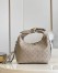 Louis Vuitton Why Knot PM Bag In Mahina Leather M20701