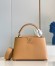 Louis Vuitton Capucines MM Bag In Arizona Taurillon Leather M59227