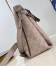 Louis Vuitton Hand It All MM Bag in Galet Mahina Leather M24133