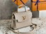 Louis Vuitton Lockme Ever Mini Bag In Greige Leather M21052