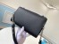Louis Vuitton Lockme Clutch In Black Calfskin M56088
