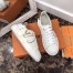 Louis Vuitton White Time Out Sneakers with Gold LV Circle