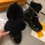 Louis Vuitton Beaubourg Ankle Boots in Black Leather with Shearling 