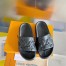 Louis Vuitton Waterfront Mules In Black Monogram Rubber