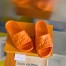 Louis Vuitton Waterfront Mules In Orange Monogram Rubber