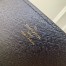 Louis Vuitton LV Book Chain Wallet In Monogram Reverse Canvas M81830